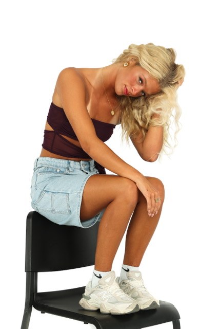 Brooke Jennings, Tone Talent Agency model, seated studio shot
