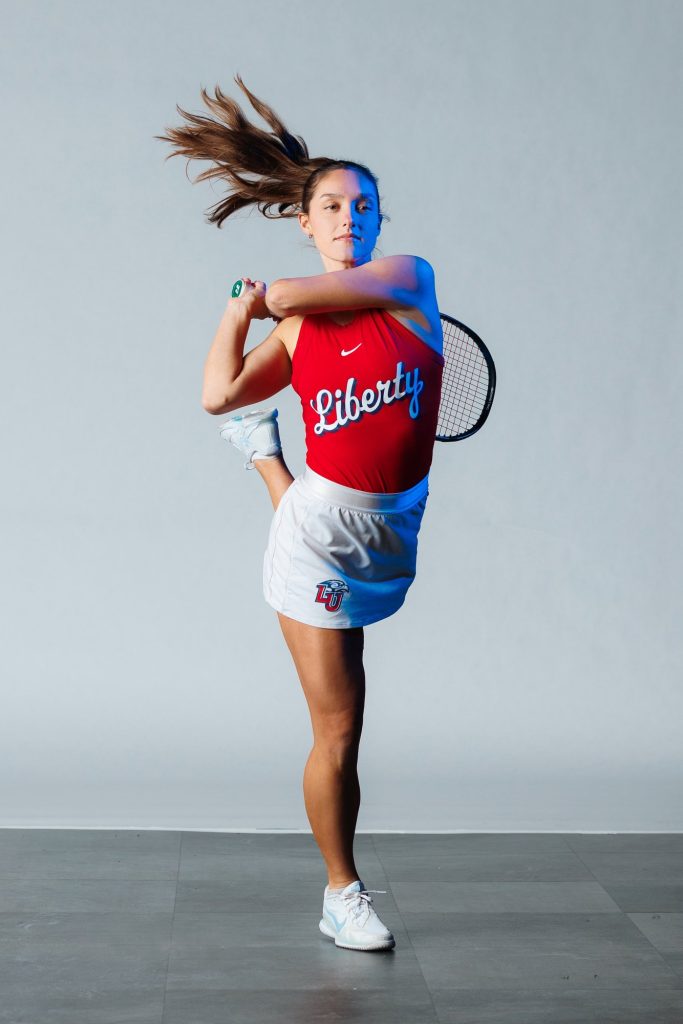 Esther Lovato, Tone Talent Agency model, studio action shot mid-swing