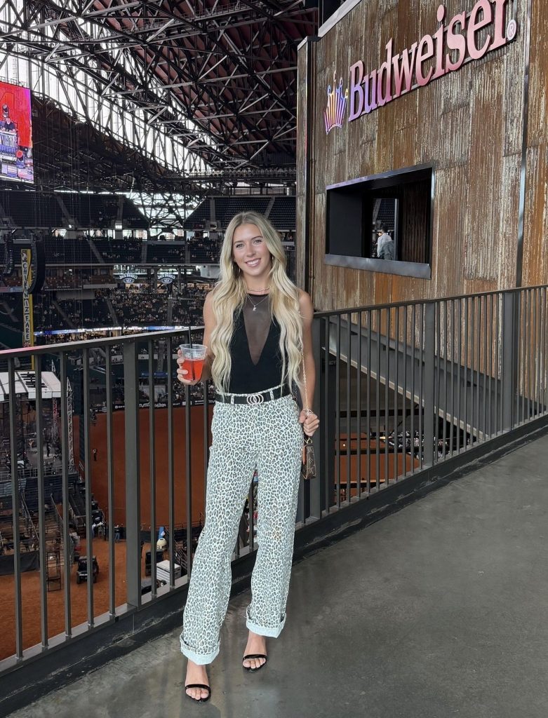 Karsen Jackson, Tone Talent Agency model, arena lifestyle shot in leopard pants